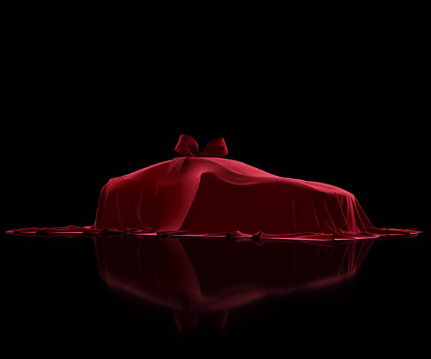 Premio auto di lusso coperto con tessuto premium su sfondo nero. Panno di velluto rosso. Regalo a sorpresa con un nodo ad arco - Foto, immagini