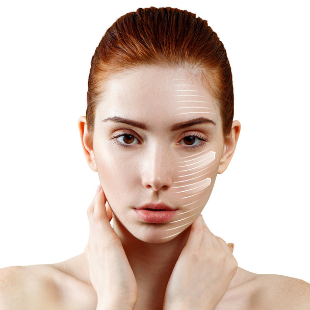 Woman redhead graphic lines shows facial lifting effect. - Photo, Image