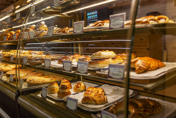 Showcase with delicious pastries. Side view. - Photo, Image