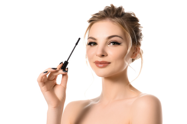 naked beautiful blonde woman with makeup and black nails holding mascara isolated on white - Foto, Bild