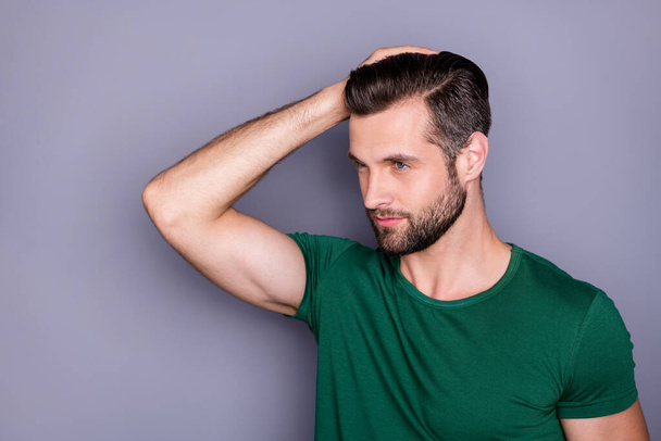 Portrait of macho dreamy man look copyspace touch hair hand try new anti dander procedure wear casual style clothes isolated over gray color background - 写真・画像