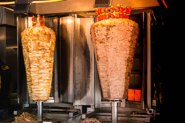 Traditional Turkish food Doner Kebab. Turnspit skewing kebap  kebab shawarma - Photo, Image