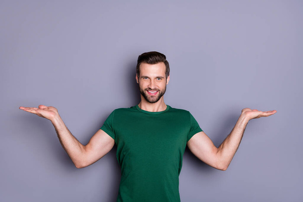 Portrait of positive confident cheerful guy promoter hold hand indicate ads promotion hold hand recommend feedback sales wear good look clothes isolated over gray color background - Φωτογραφία, εικόνα