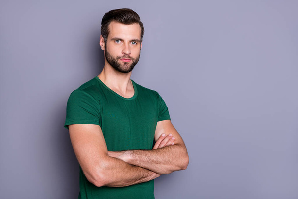 Photo of attractive guy business man boss worker neat hairdo bristle arms crossed not smiling self-confident person wear casual green t-shirt isolated grey color background - 写真・画像