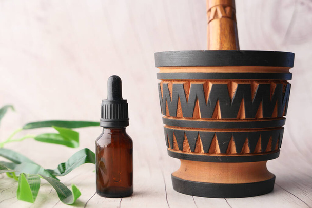 Bottle With Herbs On Wooden Background Close up - Photo, Image