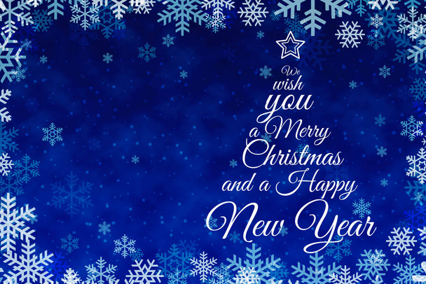 Tarjeta de felicitación navideña con texto decorativo sobre fondo azul - Foto, Imagen