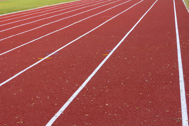 Close-up op atletiek track - Foto, afbeelding
