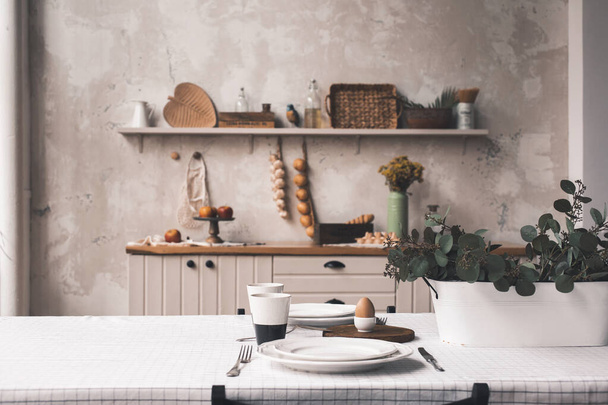 Served table, ready for breakfast. Copyspace for text. Concept of breakfast, old italian kitchen on background. - Φωτογραφία, εικόνα