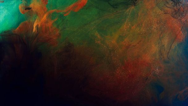 Smooth liquid gradient colorful paints moving slowly. Stock footage. Close up of rainbow color inks mixing in liquid substance, concept of art. - Photo, Image