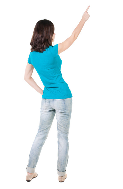 Back view of pointing woman. - Foto, Imagem