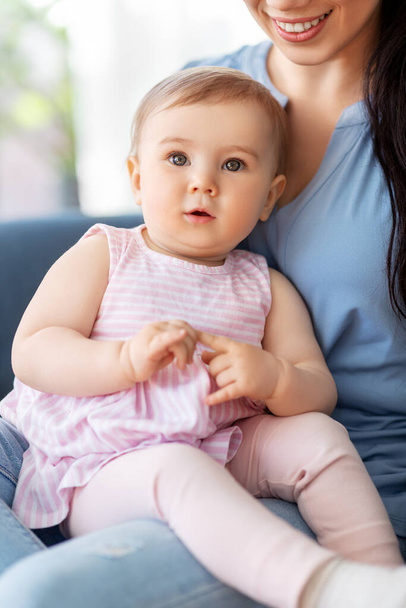 portrait of little baby girl with happy mother - Fotografie, Obrázek