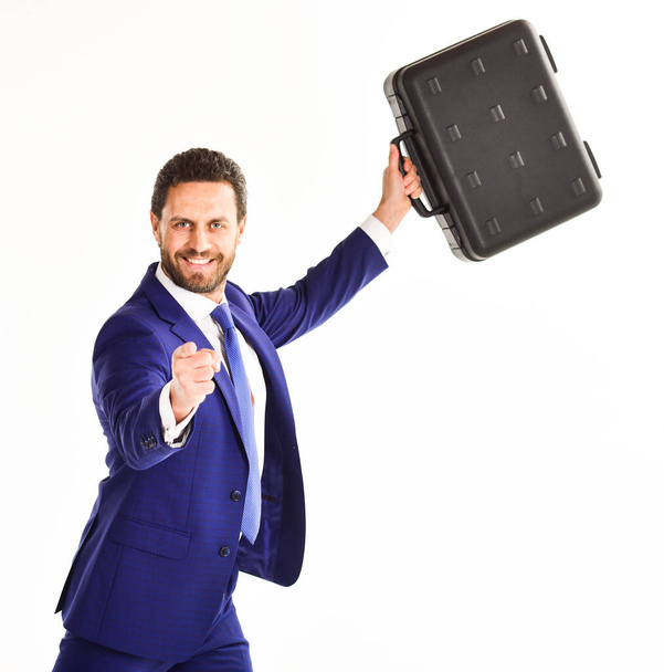 Man in suit or businessman with happy face holds briefcase - 写真・画像