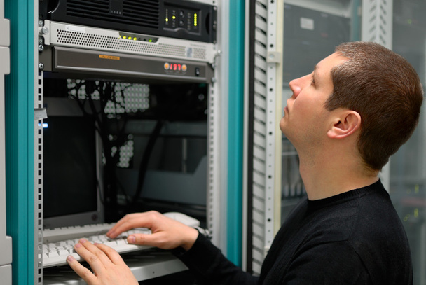 Network technician perform preventive maintenance to a server - Photo, Image