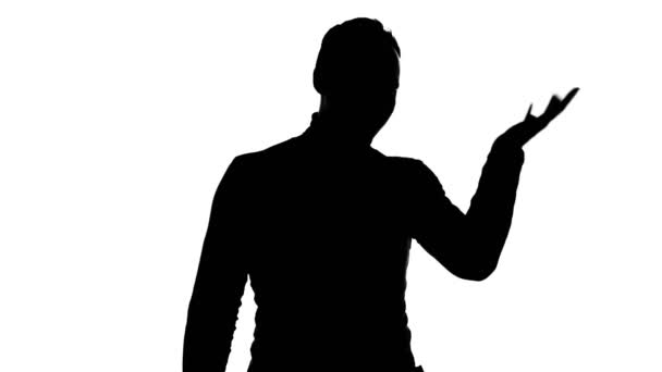 Schieten van het silhouet van de mens met facepalm gebaar - Video