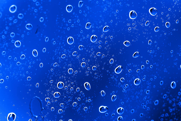 Blue Abstract Water Drops Background (en inglés). Foto de una textura abstracta
 - Foto, imagen