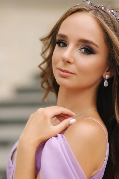 Close up portrait of beautiful girl with evening makeup outdoors - Photo, Image