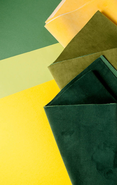 Trendy green and yellow velour textile samples. Fashion Fabric background - Foto, afbeelding