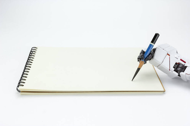 Χέρι ρομπότ κρατήσει ένα μολύβι γραφής στο παρασκήνιο - Φωτογραφία, εικόνα