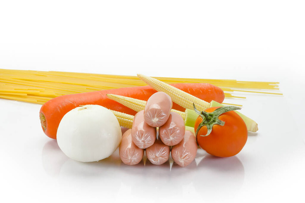 various fresh vegetables with sausage on white background - Fotó, kép
