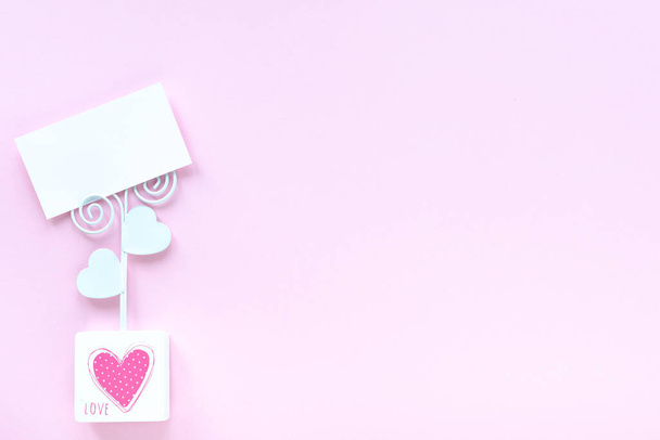 Business card mockup on pink background with copy space - Fotografie, Obrázek