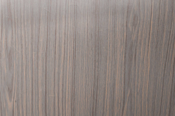 Una textura de madera pulida de color gris-naranja, fondo de madera gris
 - Foto, imagen