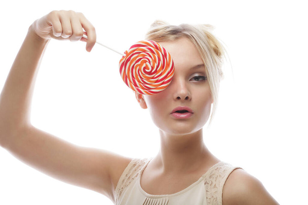 fashion blond woman holding lollipop - Foto, Imagem