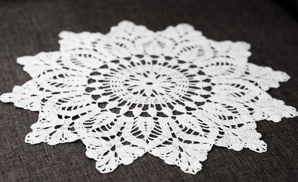 Knitting. White knitted napkin.Needlework and creativity. - Фото, зображення
