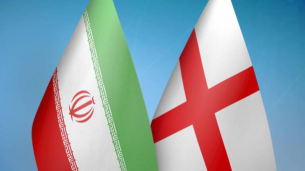 Irã e Inglaterra duas bandeiras juntos fundo azul
 - Foto, Imagem
