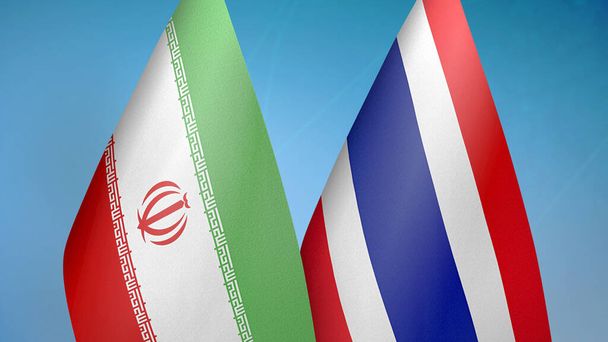 Iran en Thailand twee vlaggen samen blauwe achtergrond - Foto, afbeelding