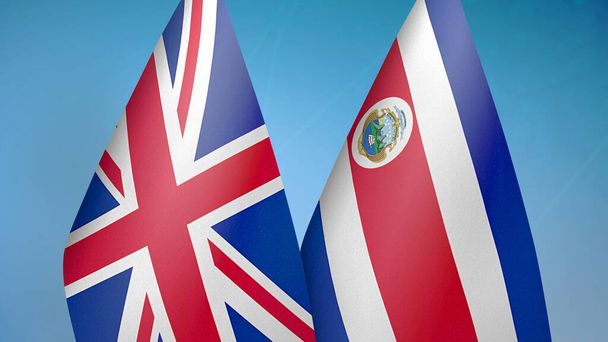 Verenigd Koninkrijk en Costa Rica twee vlaggen samen blauwe achtergrond - Foto, afbeelding