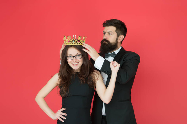 Achievement. Pride and glory. Luxury success symbol. Party night. Promotion and reward. Prom queen. Bearded man sexy girl. Royal party. Prom couple in formal style. Prom party. Holiday celebration - 写真・画像