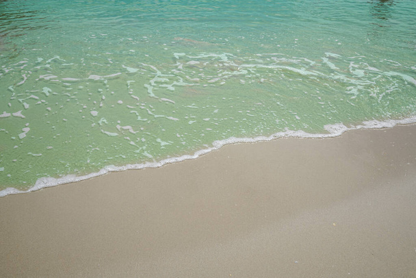Pláž a písek s vlnou vody.mořská pěna.mořská vlna - Fotografie, Obrázek
