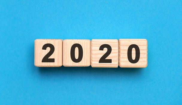 2020 years on wooden cubes on a blue background - Photo, image