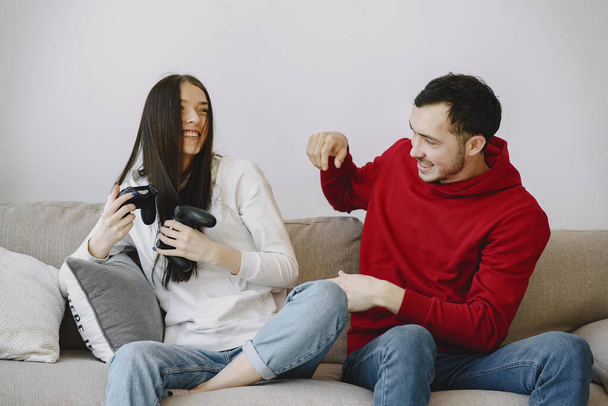 Couple at home playing in a video games - Fotó, kép