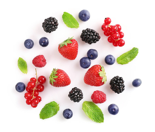 Assorted wild fresh berries isolated on white background. Top view. - Photo, Image