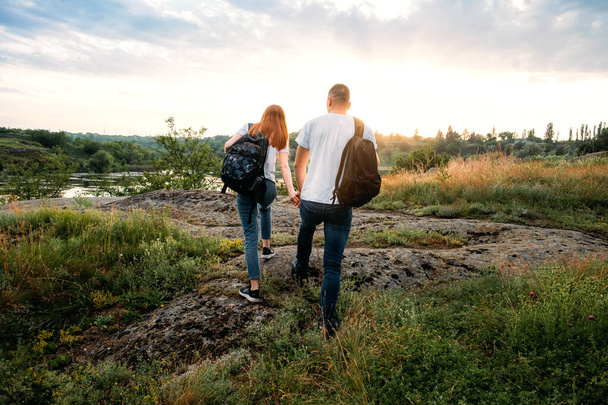 Home Country Traveling, domestic travel. Local travel, Solo Explorers, Small Group tourist. Young couple going for hiking, walk in nature - Fotoğraf, Görsel