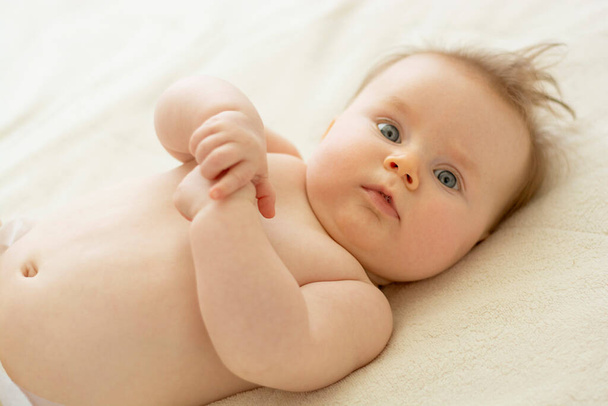 Close up cute newborn baby portrait. Baby skin care, education, parenthood. - Φωτογραφία, εικόνα