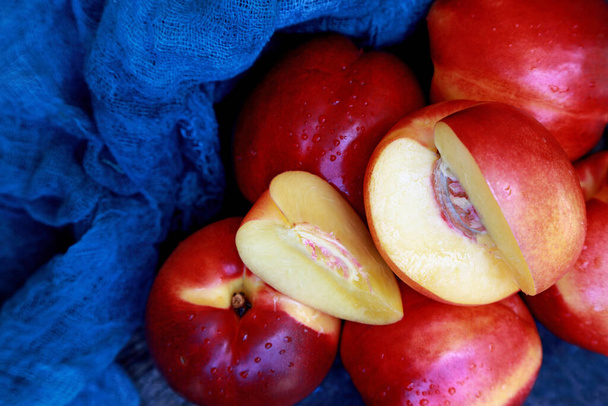 ripe juicy nectarine on the table - Photo, Image
