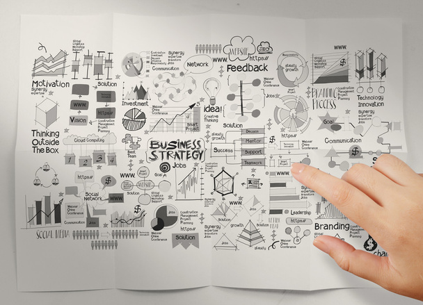 ручной указание бизнес-стратегии на скомканный бумажный фон
 - Фото, изображение