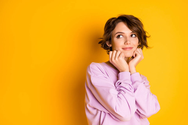 Close-up portrait of her she nice attractive lovely pretty cute dreamy cheery girl creating idea isolated on bright vivid shine vibrant yellow color background - Photo, Image