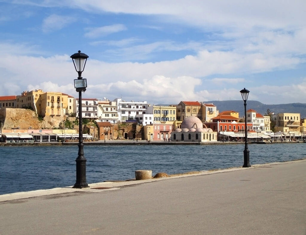 Promenade along the Aegean Sea, Old Venetian Harbour of Chania on Crete Island of Greece - Fotografie, Obrázek