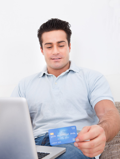 Man Shopping Online Using Laptop And Credit Card - Photo, Image
