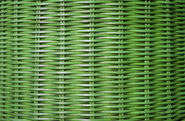 Vista frontal da superfície de móveis de vime colorido verde vibrante, para fundo e padrão
 - Foto, Imagem