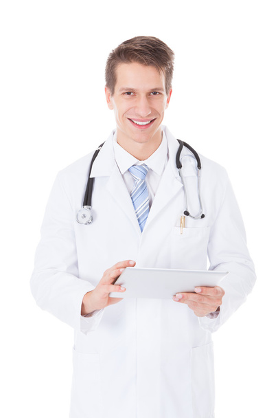 Male Doctor Using Digital Tablet - Photo, image