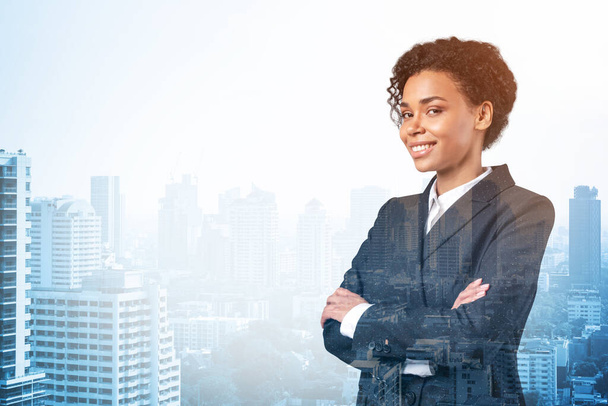 Smiling black African American business woman in suit in crossed arms pose. Bangkok cityscape. The concept of woman in business. Investment fund. Double exposure. - Photo, Image
