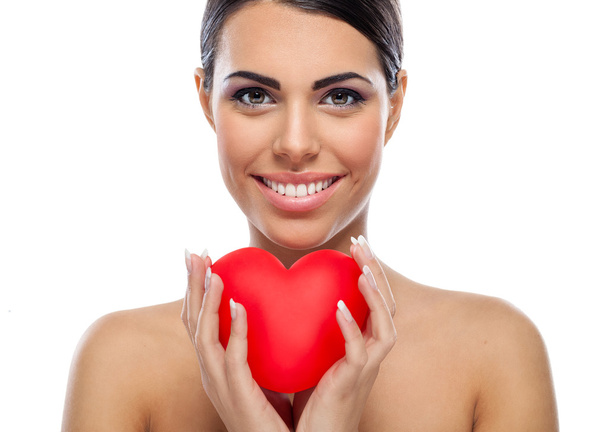 Happy woman with red hart - Photo, Image
