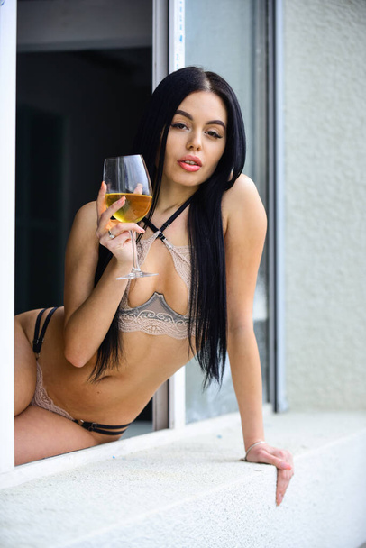 body of a woman in sexy lingerie with wine glass. beautiful sexy girl with glass of wine. Hot lady in lace lingerie. sexy lace lingerie. Woman seductive model enjoy wine. Seminude girl with alcohol - Photo, Image