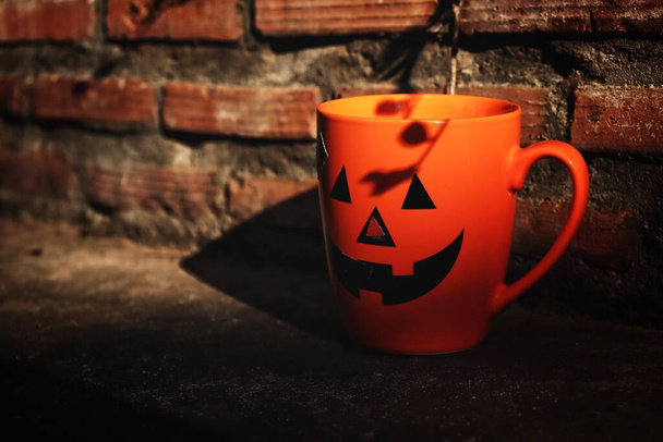 Hot coffee on halloween cup - 写真・画像