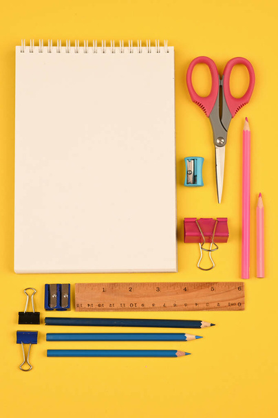 writing pad and school supplies flat lay. High quality photo - Фото, изображение