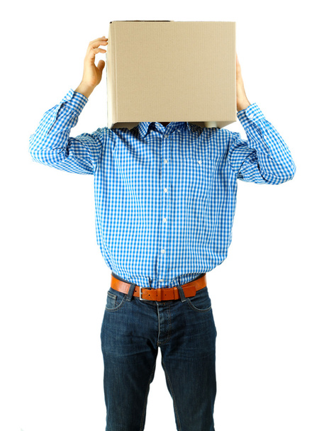 Man with cardboard box on his head isolated on white - Foto, afbeelding